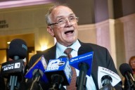 Wisconsin judge rejects motions to dismiss charges against President Donald Trump aides