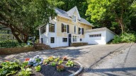 Roslyn house for sale has frilly details, many renovations