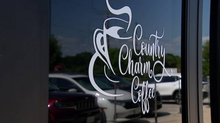 Solicitor charged with assaulting veteran turned Anna cafe owner