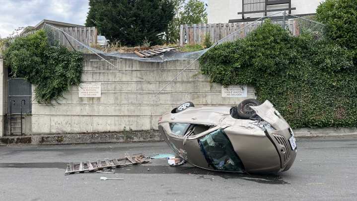 1 person in hospital after vehicle falls off ledge, into grocery parking lot: VicPD