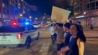 Crowd in DC outraged by federal law enforcement presence as cars stopped on busy street