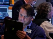 U.S. stocks extend slide as Walmart misses, jobless claims rise