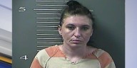 Woman arrested after reportedly trying to run over social workers