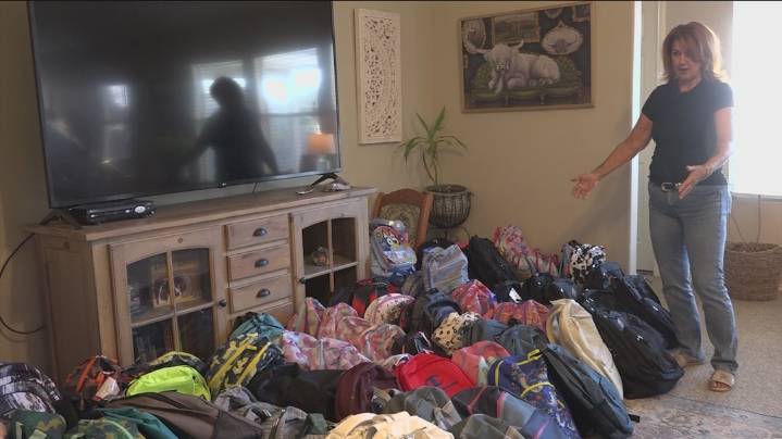Leander ISD bus driver aids flood victims with back