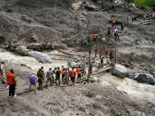 Photos: Rescuers search for missing after devastating Kashmir cloudburst