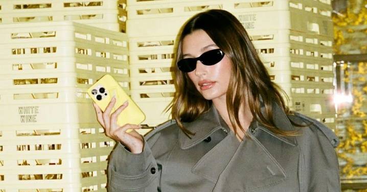 Hailey Bieber Goes Pantsless in Skimpy Fall Trench Coat & Nothing Else