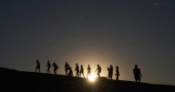 Searing heat draws visitors to California's Death Valley, where it's tough to communicate the risks