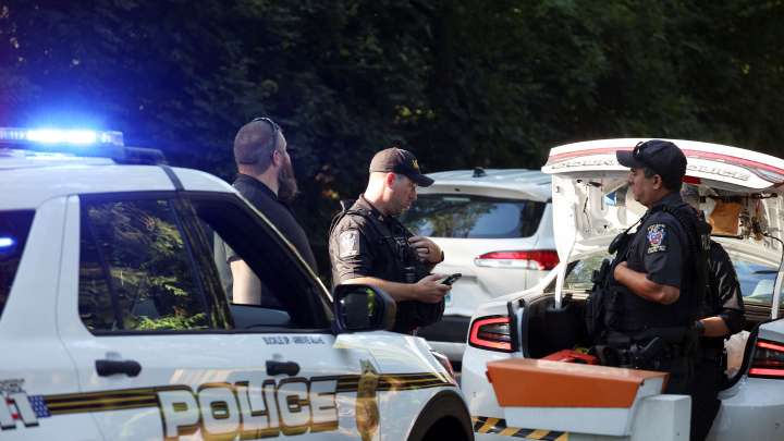 Moment John Bolton's home is swarmed by FBI in dawn raid as part of high-profile probe into classified documents