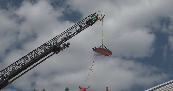 Local 'Spiderman' stranded on top of roof