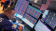 U.S. stocks slide following inflation report, but world shares are mostly higher