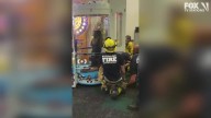 Woman gets stuck in Chuck E. Cheese game