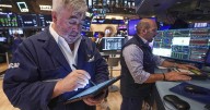 US stocks pull back from records after a hotter