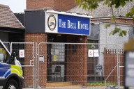 Three men arrested after officers injured at Epping hotel protest