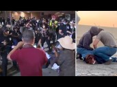 Demonstrators face off with police, demanding the release of nurse taken into federal custody