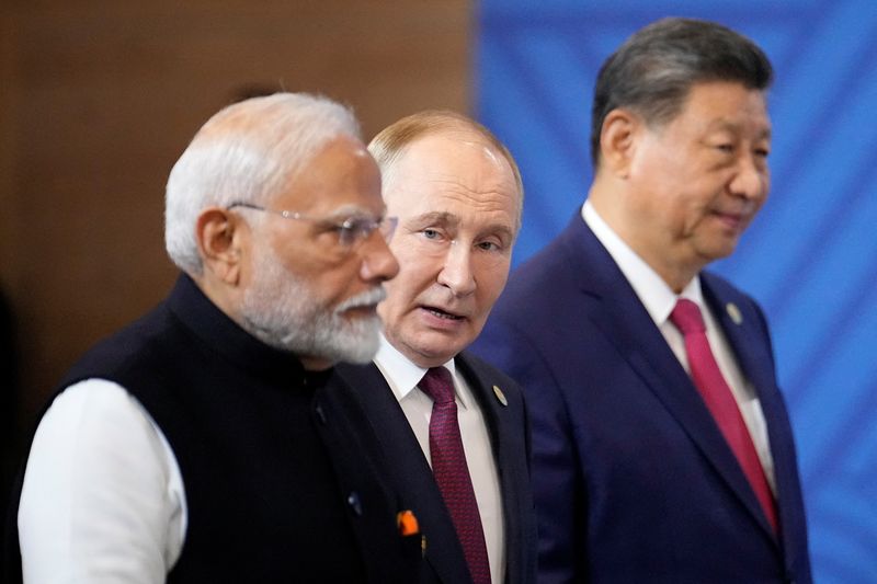 Putin calls Xi, Modi and other foreign leaders ahead of planned meeting with Trump