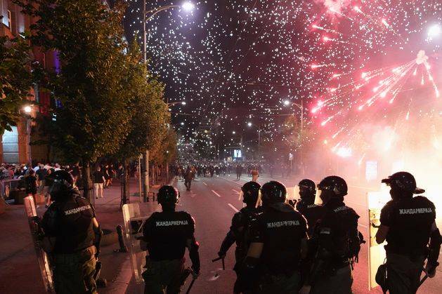 Serbia’s police detain hundreds during violent anti