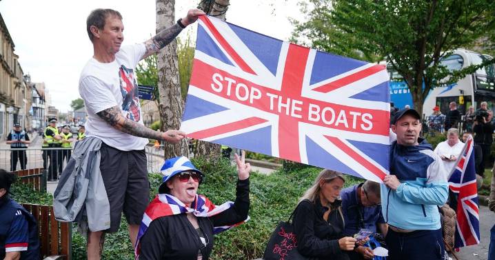 Russia to track all migrants and 'demand DNA' while UK hotel fury grows