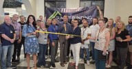 Summit Funding Inc. holds ribbon