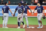 Mariners catch Astros in the AL West after beating Baltimore for their 8th straight win