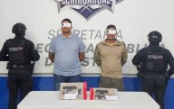 Detienen a dos hombres armados; decían que eran escoltas