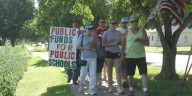 Eastern Iowa teachers march for public school funding ahead of school year beginning