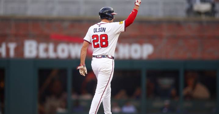 Matt Olson slides past Pete Rose as consecutive games streak continues