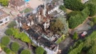 Two girls arrested after historic hotel destroyed in suspected arson attack