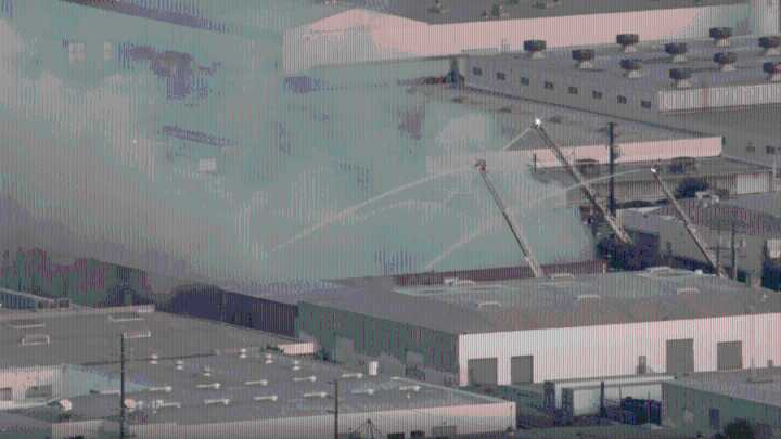 Crews battle warehouse fire in Commerce