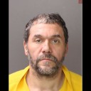 Levittown man hit with new charges after armed robbery and officer