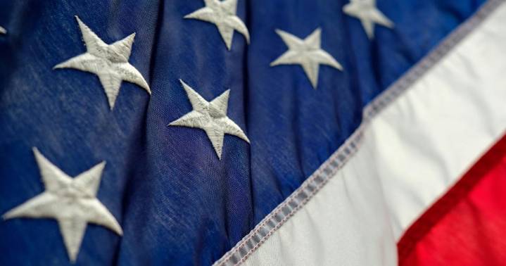 Local car wash raises nearly $10K for families of fallen officers