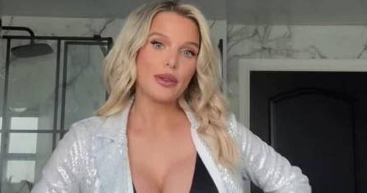 Helen Flanagan slips curves into plunging top as mum