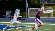 Erwin wins 21-7 victory over Burns at Buncombe County…