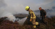 Crews battling a wildfire in English countryside face added risk of hidden WWII