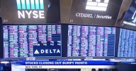 Stocks pull back from their latest all-time highs on Wall Street
