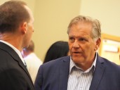Whispering Republicans bewildered as senate candidate flees ritzy Michigan GOP dinner