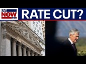 Stocks surge after Fed Chair Jerome Powell hints at possible interest rate cut