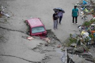 Flash floods leave 32 dead in Indian-controlled Kashmir as over 150,000 are displaced in Pakistan