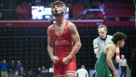 Which sports helped high school athletics reach another record high?