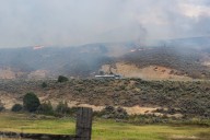 Brush fire reported near Echo Creek Ranch Road, threatening structures