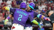 Gurriel, Perdomo each homer, drive in 3 runs in the Diamondbacks' 10