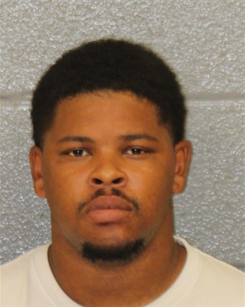 Volunteer CMS football coach charged with indecent liberties with a student