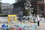 Artist drowns sculpture in plastic waste in front of the UN during plastic pollution treaty talks