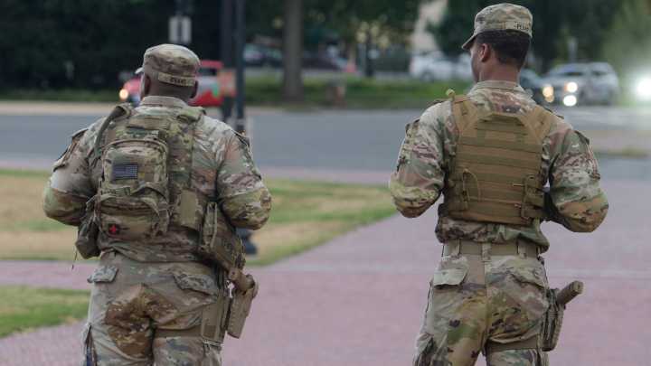 Some National Guard units in D.C. now carry firearms in escalation of Trump deployment