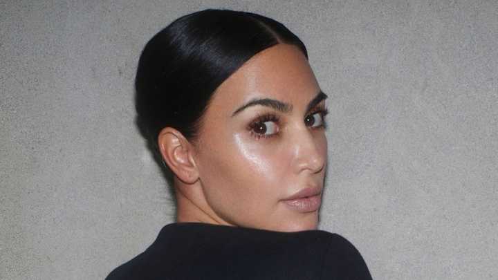 Kim Kardashian reveals her bare butt in see-through underwear with cheeky message for new Skims photoshoot