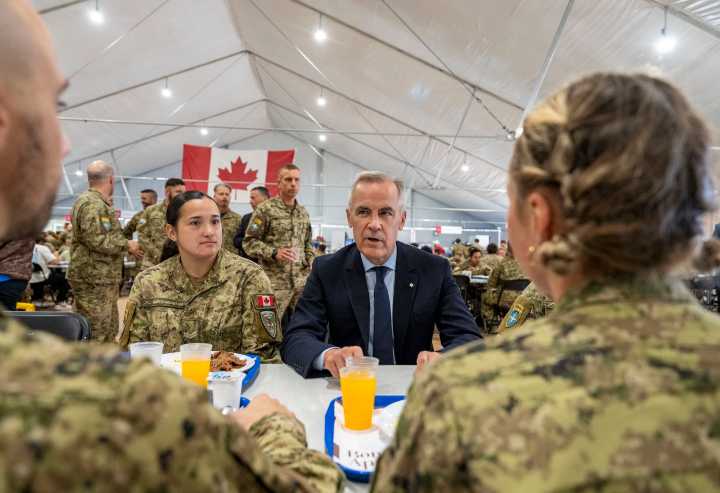 Carney tours Latvian military base to wrap up European trip