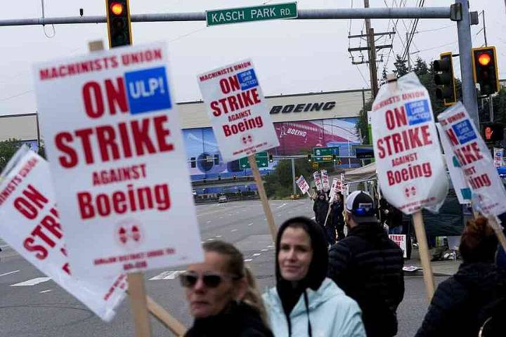 Boeing workers strike, reject pact
