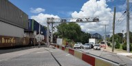 Blocked train crossings trap drivers, force pedestrians to climb through cars