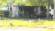 Trailer home in Liberty catches fire again, previous blaze investigated as arson