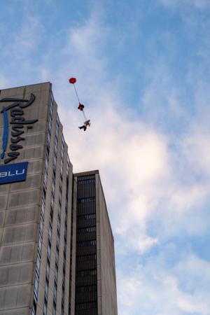 Daredevil scales and jumps off of 26