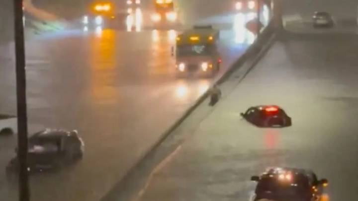 MLB stadium leaks and carpark floods after severe storms ravage game with cars terrifyingly stuck underwater